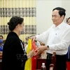 Tet gifts presented to policy beneficiaries nationwide