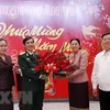 Lao top legislator pays Tet visit to Vietnam’s officers, soldiers working at Laos' NA House