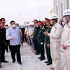  Lao leader pleased with quality, progress of Vietnamese-funded NA building