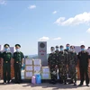 Dien Bien presents aid to armed forces of Lao provinces