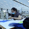 COVID-19 resurgence leaves textile-garment makers restless