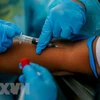 Philippines targets workers in next phase of COVID-19 vaccination 