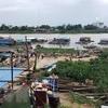 Vietnamese-Cambodians obey notice on relocating floating houses