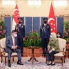 Singaporean President delighted at development of ties with Vietnam