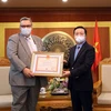 Finnish Ambassador to Vietnam receives "For the Cause of Natural Resources and Environment” insignia