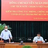 President works with leaders of HCM City