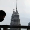 COVID-19 darkens Malaysia’s 2021 economic outlook