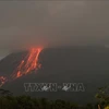 Indonesia’s Merapi volcano erupts, spewing ash
