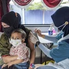 Malaysia starts vaccination rollout for adolescents