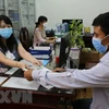 Hanoi helps pandemic-hit people with over 3 trillion VND