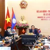 Vietnam, Laos talk enhancement of labour, social welfare cooperation
