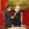Party leader welcomes visiting chairman of Lao parliament
