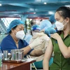 HCM City start injecting third COVID-19 vaccine jab for frontline workers