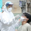 Vietnam reports 15,377 COVID-19 infections on December 13