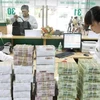 Reference exchange rate down 13 VND at week’s beginning