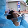 Vietnam sees 16,325 COVID-19 infections on December 21