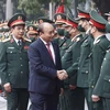 President urges stronger development of Vietnamese military science, art and culture