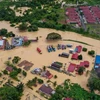 Thousands of Malaysians evacuate from flooding