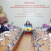 Organisation commissions of Vietnamese, Lao Parties foster cooperation