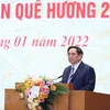 PM meets OVs joining “Xuan Que huong” programme