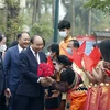 State leader joins ethnic groups in spring festival
