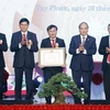 President attends ceremony recognising Binh Dinh’s Tuy Phuoc as new-style rural district