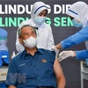 Malaysia administers COVID-19 booster shot to protect vulnerable people