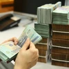 Reference exchange rate down 3 VND at week’s beginning