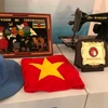 Peacekeeping officers present souvenirs to Vietnam Women's Museum