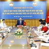 Vietnamese, Laos Fronts foster cooperation