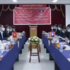 Party information-education commission leader busy in Laos
