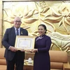VUFO presents insignia to outgoing Belgian Ambassador to Vietnam
