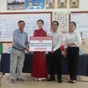 Gifts presented to students of Khmer-Vietnam friendship primary school in Cambodia