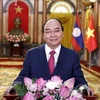 Vietnam-Laos friendship, solidarity, cooperation to further thrive: President