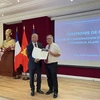 National external information service award presented to French historian