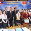 Vietnam, Laos foster education cooperation