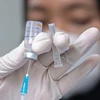 Indonesia licenses first home-grown COVID-19 vaccine 