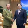 PM receives Lao Deputy PM and Minister of Public Security