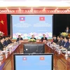 Vietnam, Laos step up cooperation in mass mobilisation