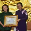 Certificate of merit conferred upon Argentine friend of Vietnam