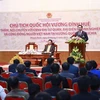 Top legislator meets Vietnamese people in Cambodia