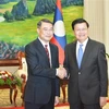 Top Lao leader receives Vietnamese Party official