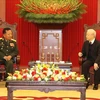 Vietnamese leaders receive Lao Deputy PM, Defence Minister