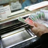 Malaysia strives to lower national debt