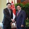 Prime Minister Pham Minh Chinh meets with Singaporean Deputy PM