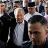 Malaysia’s former PM gets bail, going to court for corruption charge