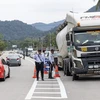 Malaysia forbids foreigners to drive trailer lorries