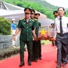 Reburial held in Thanh Hoa for remains of martyrs repatriated from Laos