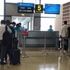 Vietnam Airlines notifies passengers of departure gates via messages at three airports