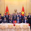 Vietnam, Laos bolster cooperation in social sciences